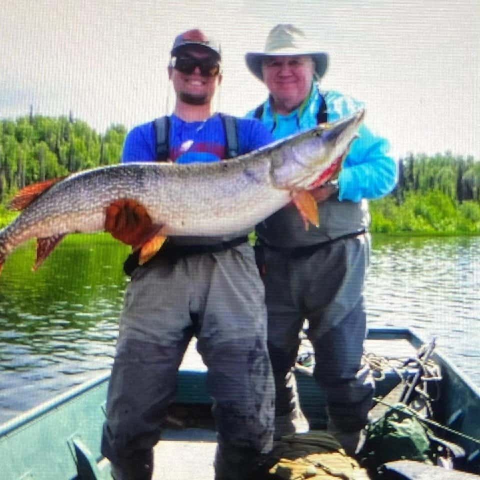 Alaska northern pike fly fishing at a remote lake near Anchorage.