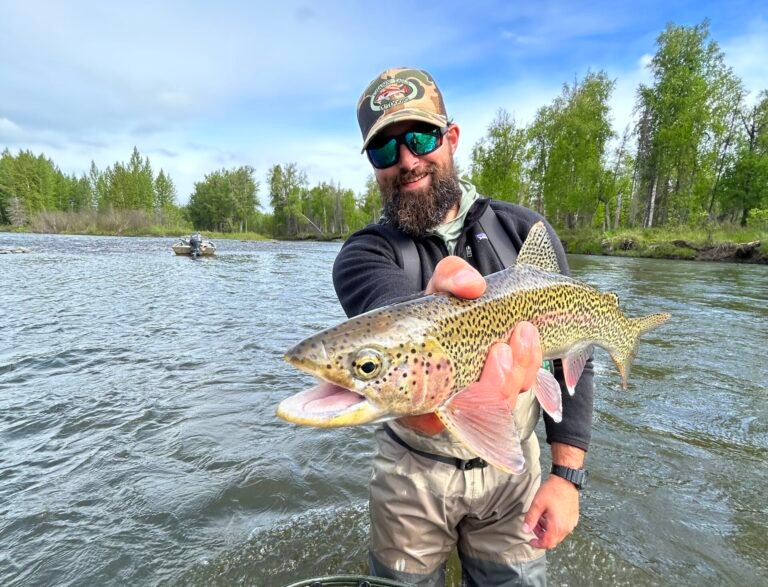 An incredible trophy rainbow trout on a fly fishing trip to remote Wilderness Place Lodge.