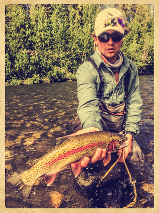 A beautiful wild rainbow trout caught fly fishing at Wilderness Place Lodge.