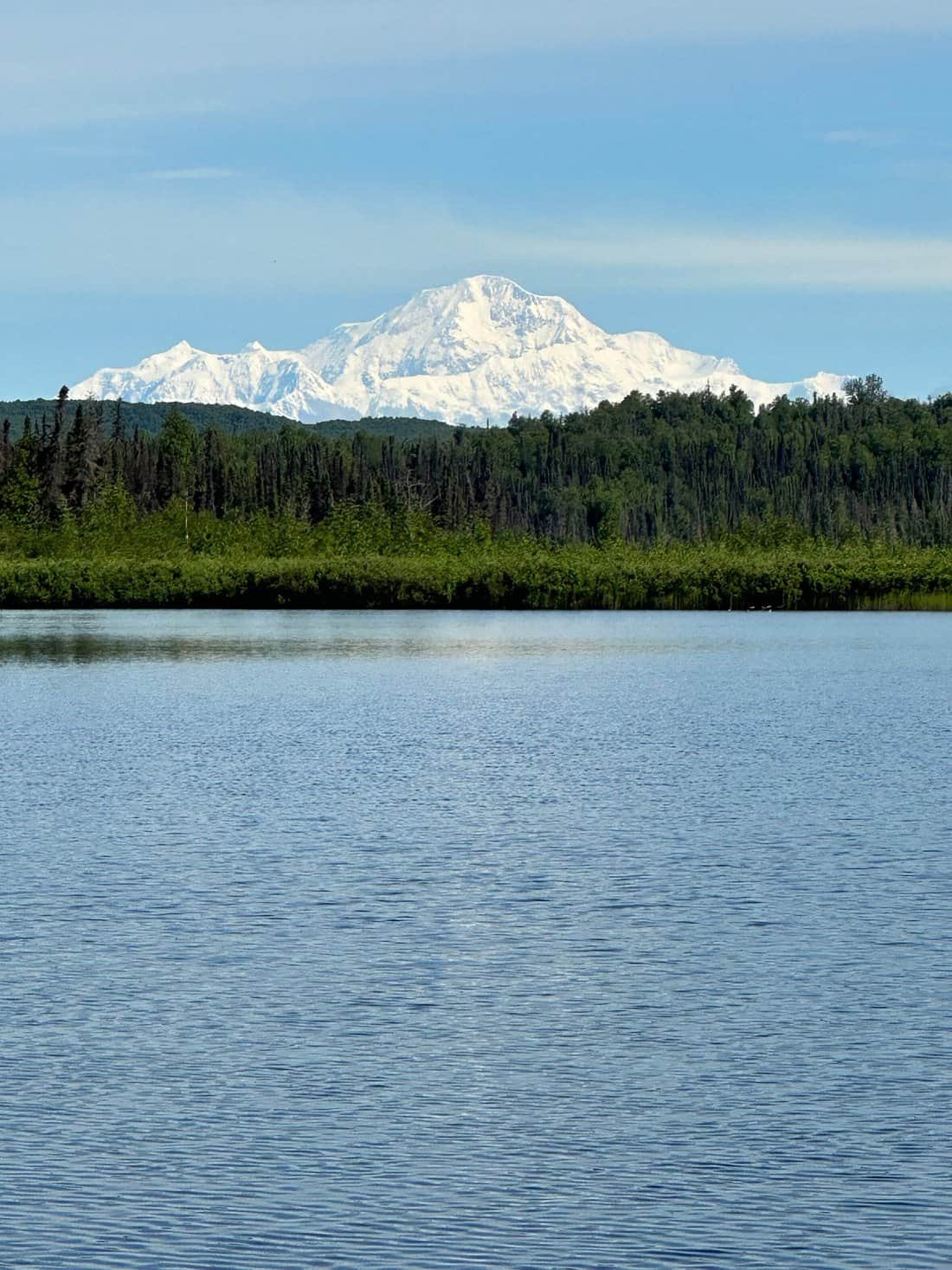 Alaska Denali mountain view off the Yentna River near Wilderness Place Lodge.