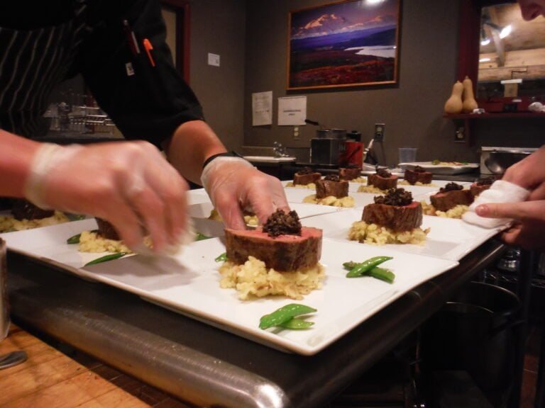 Alaska wilderness place lodge chef team prepares the finest dinner entrees for our fishing guests.